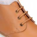 TAN color Nappa Leather kids booties with laces closure.