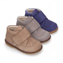 Suede Leather kids booties with chopped design and laceless.