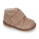 Suede Leather kids booties with chopped design and laceless.