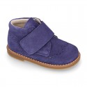 Suede Leather kids booties with chopped design and laceless.