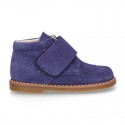 Suede Leather kids booties with chopped design and laceless.
