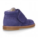 Suede Leather kids booties with chopped design and laceless.