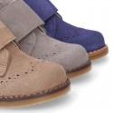 Suede Leather kids booties with chopped design and laceless.