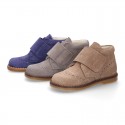 Suede Leather kids booties with chopped design and laceless.