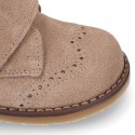 Suede Leather kids booties with chopped design and laceless.