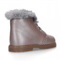 Girl safari boots with ties closure and fake hair neck in PEARL leather.