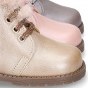 Girl safari boots with ties closure and fake hair neck in PEARL leather.