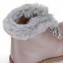 Girl safari boots with ties closure and fake hair neck in PEARL leather.