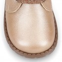 Girl safari boots with ties closure and fake hair neck in PEARL leather.