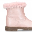 Girl boots with zipper closure and fake hair neck in PEARL effect leather.