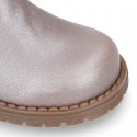 Girl boots with zipper closure and fake hair neck in PEARL effect leather.