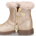 Girl boots with zipper closure and fake hair neck in PEARL effect leather.