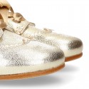 LAMINATED GOLD leather Girl Laces up shoes with silk laces.