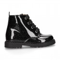 ROCK style BLACK patent finish girl boots with metal ties closure.