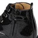 ROCK style BLACK patent finish girl boots with metal ties closure.