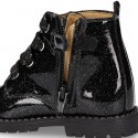 ROCK style BLACK patent finish girl boots with metal ties closure.