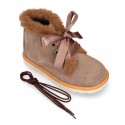 Girl safari boots with SILK ties closure and fake hair neck in Suede leather.