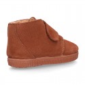 TAN color Suede leather little bootie sneaker style with fake hair lining and laceless.