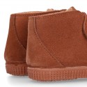 TAN color Suede leather little bootie sneaker style with fake hair lining and laceless.
