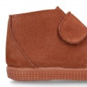 TAN color Suede leather little bootie sneaker style with fake hair lining and laceless.