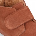 TAN color Suede leather little bootie sneaker style with fake hair lining and laceless.