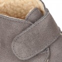 Suede leather Baby safari boots laceless and with wool knit lining.