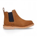 Kids ankle boots with elastic band in suede leather in TAN color.