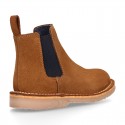 Kids ankle boots with elastic band in suede leather in TAN color.