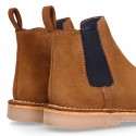 Kids ankle boots with elastic band in suede leather in TAN color.