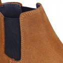 Kids ankle boots with elastic band in suede leather in TAN color.