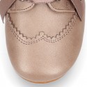 LAMINATED COPPER leather Girl Laces up shoes with silk laces.