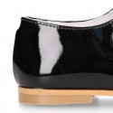 Classic PATENT leather little girl Mary Janes with hook and loop with button.