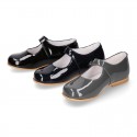 Classic PATENT leather little girl Mary Janes with hook and loop with button.