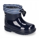 Little NAVY style Rain boots with adjustable neck for little kids.