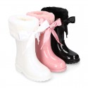 SHINY COUNTRY style Rain boots with fake hair design and bow.