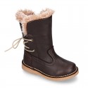 SOFT NAPPA leather kids ankle boots with fake hair lining, zipper closure and shoelaces.