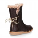 SOFT NAPPA leather kids ankle boots with fake hair lining, zipper closure and shoelaces.