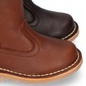 SOFT NAPPA leather kids ankle boots with fake hair lining, zipper closure and shoelaces.