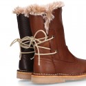 SOFT NAPPA leather kids ankle boots with fake hair lining, zipper closure and shoelaces.