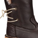 SOFT NAPPA leather kids ankle boots with fake hair lining, zipper closure and shoelaces.