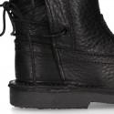 BLACK SOFT NAPPA leather kids ankle boots with fake hair lining, zipper closure and shoelaces.