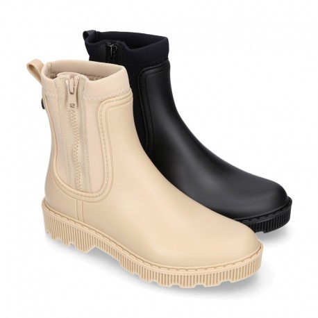 Women Ankle rain boots with NEOPRENE elastic band and MOUNTAIN soles design.