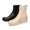 Women Ankle rain boots with NEOPRENE elastic band and MOUNTAIN soles design.