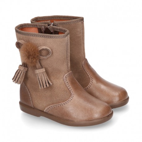 Classic kids suede leather boots with TASSELS and FAKE HAIR POMPONS design.