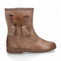 Classic kids suede leather boots with TASSELS and FAKE HAIR POMPONS design.