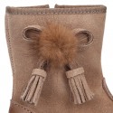 Classic kids suede leather boots with TASSELS and FAKE HAIR POMPONS design.