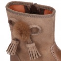 Classic kids suede leather boots with TASSELS and FAKE HAIR POMPONS design.