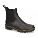 MATTE colors Ankle rain boots with elastic band and MOUNTAIN soles design.