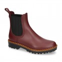 MATTE colors Ankle rain boots with elastic band and MOUNTAIN soles design.