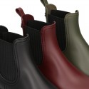 MATTE colors Ankle rain boots with elastic band and MOUNTAIN soles design.